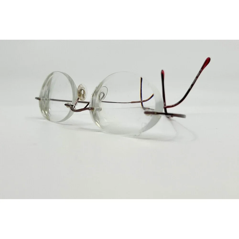 Dollar Optical Eyeglasses Unisex Red Beta Titanium Rimless Oval BT 2000 150
